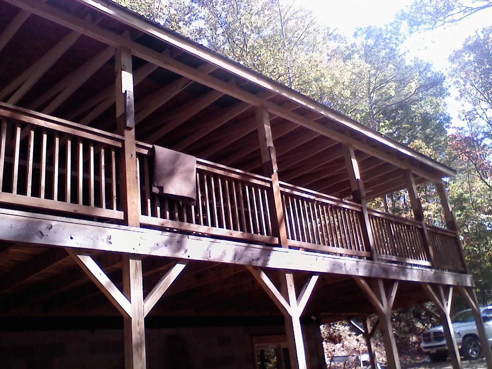 Timber framing under a new elevated porch and deck — Roof Leak Repair in Mill Neck by Roofing Brothers